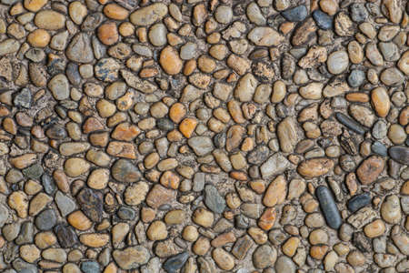 Colorful round pebble stone texture for wallpaper and background. Abstract background. Texture background. Macro photography. Close upの写真素材