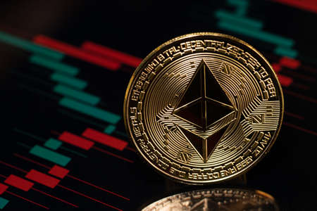 Ethereum coin token with candlestick chart background. Digital currency. Cryptocurrency