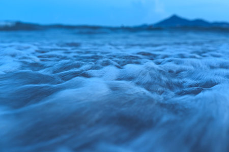 Sea waves on the beach in the evening. Long exposure photo.の写真素材