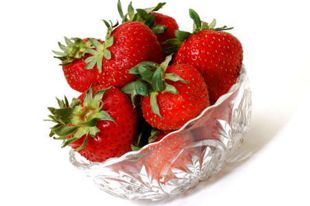Bowl of strawberries isolated on white background.の写真素材