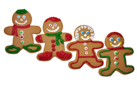 Four decorated gingerbread cookies isolated on white 