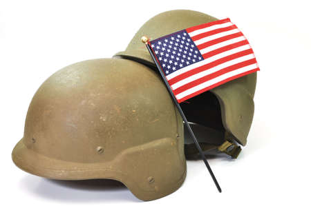 Military helmets and American flag isolated on white background.の写真素材