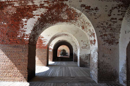 Archways at Fort Pulaski, Georgia with cannon in background.の写真素材
