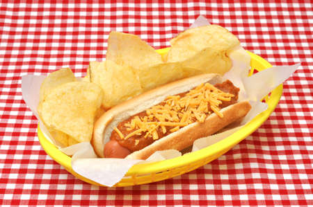 Chili Cheese Hot Dog with Potato Chipsの写真素材