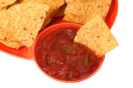 Plate of tortilla chips and salsa isolated on white background の写真素材
