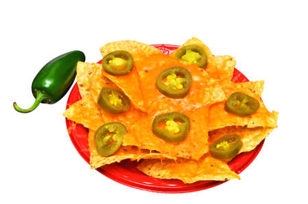 Plate of nachos with jalapeno pepper isolated on white の写真素材