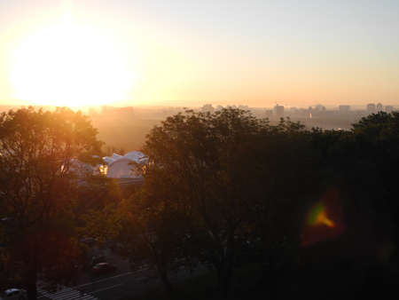 Gentle morning sun. Urban landscape in the morning haze