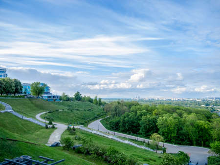 Beautiful landscape of the summer city of Kiev. View from the hills in the park.