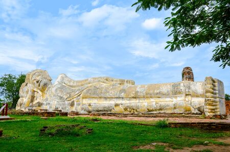 The World Heritage - Ancient Reclining Buddha Statue in Ayutthaya, Thailand の写真素材