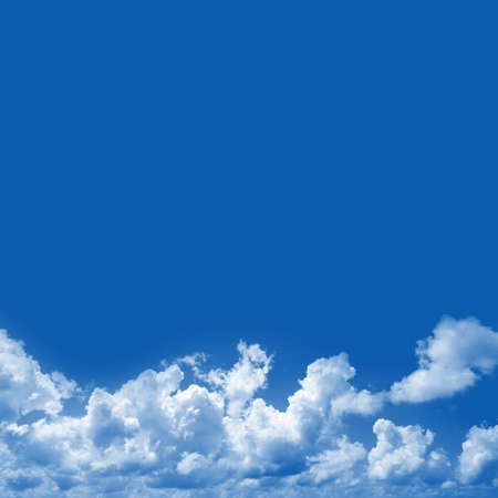 Blue Sky Background With Clouds and Space for Text Isolated on Blue の写真素材