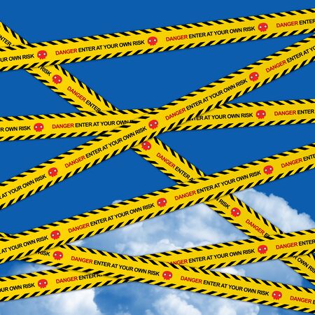Danger Enter At Your Own Risk Caution Tape in Blue Sky Backgroundの写真素材