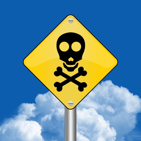 Yellow Rhombus Road Sign For Danger Zone Against The Blue Sky Background の写真素材