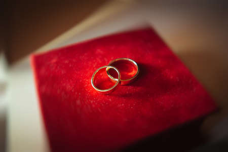 Wedding items. Wedding rings on red boxの写真素材
