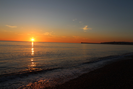 Sunset over Sussex beachの写真素材