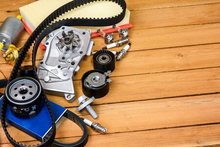 Various spare parts for the car. The set of timing belt with rollers, cooling pump, sparking plugs...