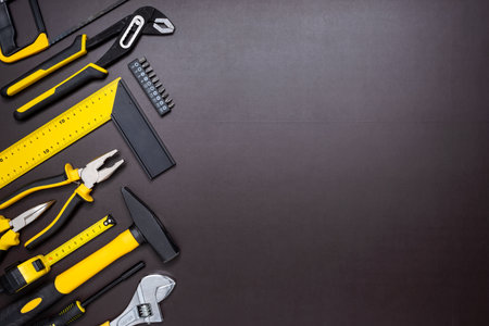 Various hand tools for build and repairing on working table with copy space for text.の写真素材