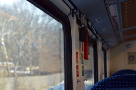 Emergency glass hammer as a detail of the modern train interiorの写真素材