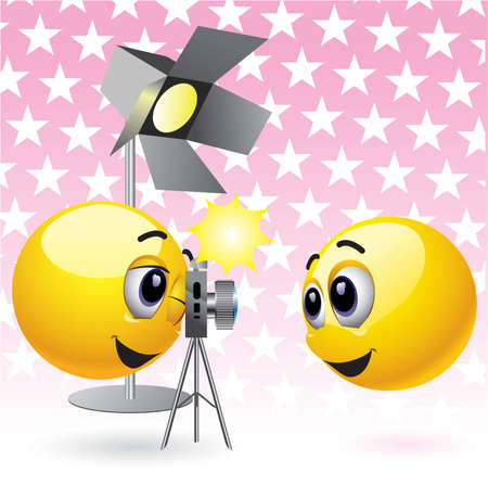 Smiling balls taking photographs in studioのイラスト素材