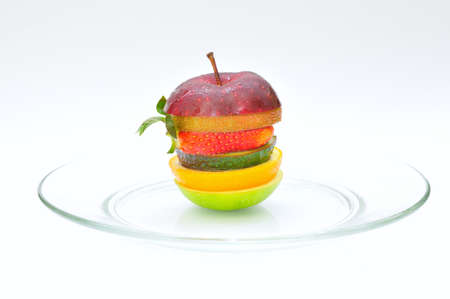 Layer of fruits isolated on a plateの写真素材