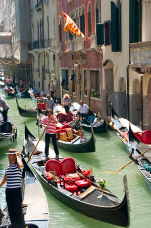 VENICE, ITALY - AUGUST 11, 2012: Nice view of Gondolas in Venice channels.のeditorial素材
