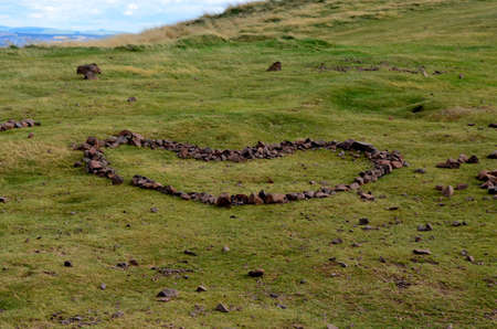 A heart made of stones at Archer's Chair in Scotland.の写真素材