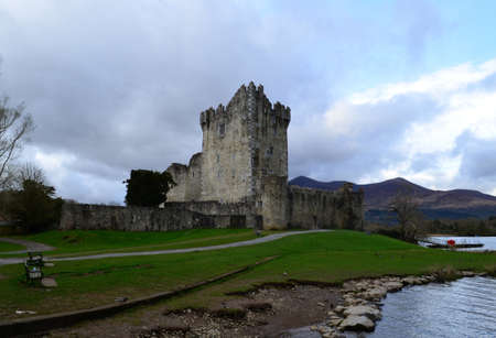 Storm clouds rolling over Ross Castle in Killarney Ireland.の写真素材