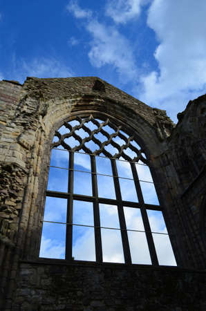 Stone window ruins of Holyrood Abbey in Edinburgh Scotland.の写真素材