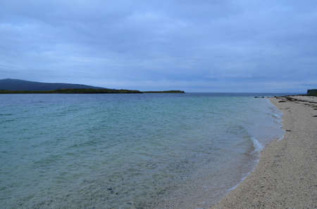 Gentle waves coming ashore on Claigan coral beach.