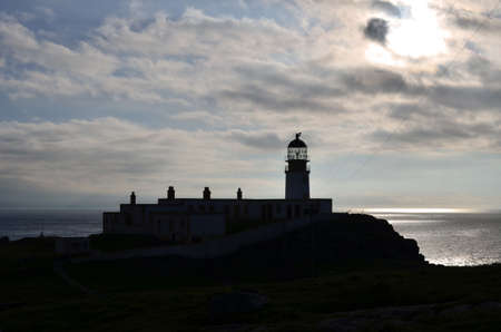 Beautiful Neist Point Lighthouse at dusk in Scotland.の写真素材