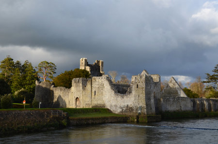 Scenic views of Desmond castle ruins in Ireland on River Maigue.