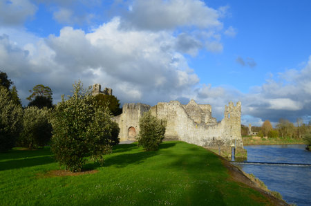Desmond castle ruins bathed in sunshine in Ireland.