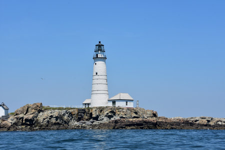 Picture perfect day with views of Boston Harbor Light in the summer.の写真素材