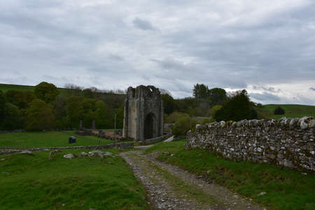Rural landscape and road to Shap Abbey ruins in Cumbria England.の写真素材