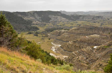 Badlands with eroding landscape and painted canyon in North Dakota.