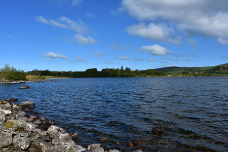 View across Ennerdale Resevoir water in northern England on a spring day.の写真素材
