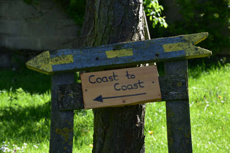 Home made coast to coast route marker showing the way.の写真素材