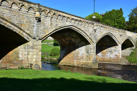 Beautiful old stone archway bridge in England.