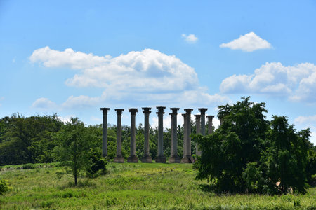 Spring landscape with stone pillars and columns arranged in a pattern.の写真素材