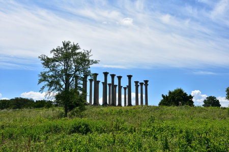 Historic Capitol pillars monument in a scenic botanical garden in the spring.の写真素材