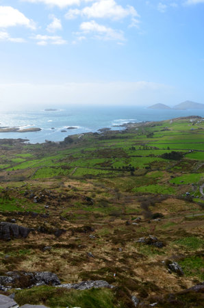 Irish landscape with fields along the coastline.
