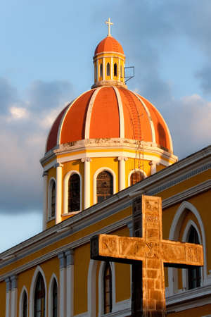 Cathedral of Granada with stone cross at sunset, Nicaragua の写真素材