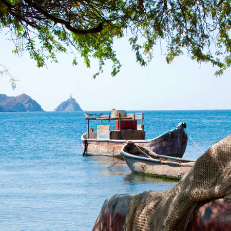 Colombian fishing boat in the  Caribbean  bay of Taganga, Colombiaの写真素材