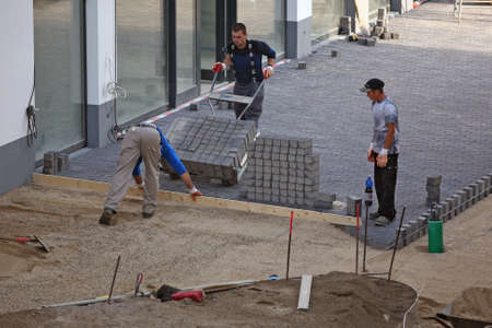 Dusseldorf, Germany - 16  July 2013   Workers carry out landscaping on one of the new settlements in...