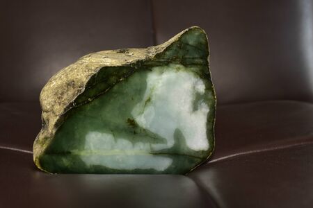 A collection of various tumbled green jade mineral stones (nephrite and jadeiteの写真素材