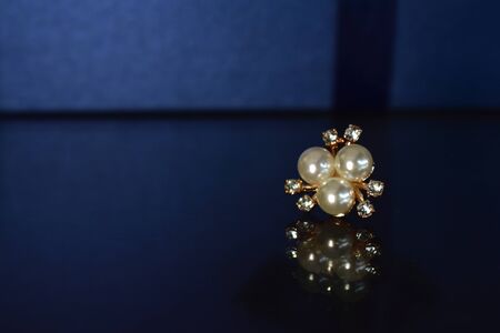 Gold earrings Decorated with pearl Luxurious and beautifulの写真素材