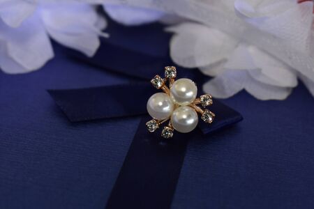 Gold earrings Decorated with pearl Luxurious and beautifulの写真素材