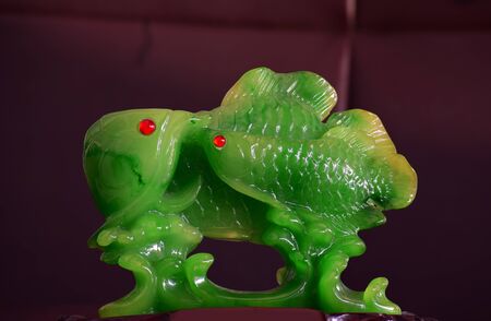 jade Is a jade carving of two beautiful fishesの写真素材