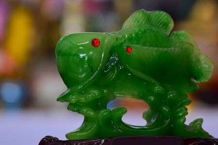 jade Is a jade carving of two beautiful fishesの写真素材