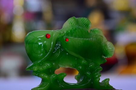 jade Is a jade carving of two beautiful fishesの写真素材