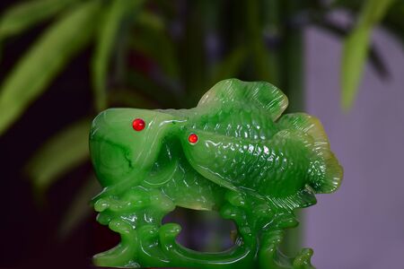 jade Is a jade carving of two beautiful fishesの写真素材